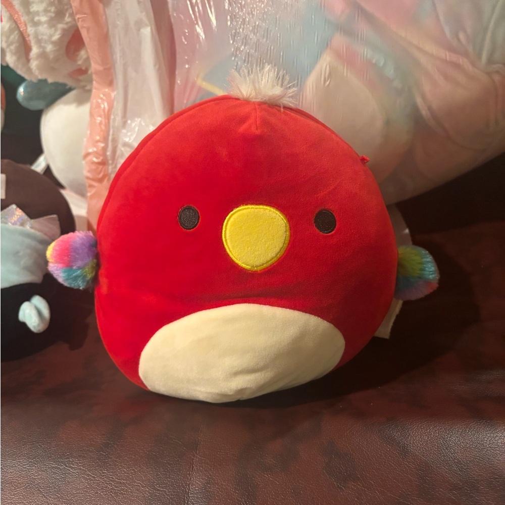 Red squishmallow parrot